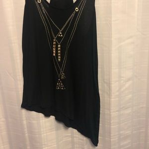 Black tank with asymmetrical hem.